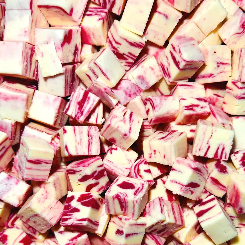A bag of Carousel raspberry nougat, pink through the slab